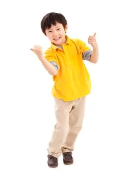 Cute boy doing thumbs up Fotos Stock