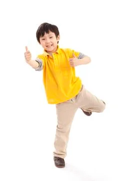 Cute boy doing thumbs up Fotos Stock