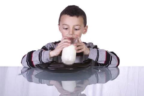 Cute Boy Drinking Milk Stock Photos
