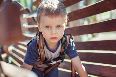 Cute boy in an extreme park. Stock Photos