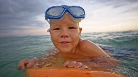 Cute boy in goggles portrait Stock Footage 95127316