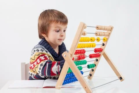 Cute boy, learning to count and math Stock Photos