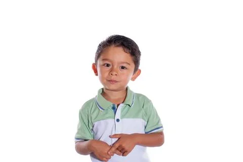Cute boy looking at camera, isolated on white background. Nice looking latin boy Stock Photos