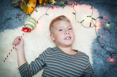 Cute boy meets a new year Stock Photos