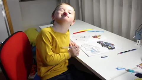 Cute boy mocks camera Stock Footage 300502576