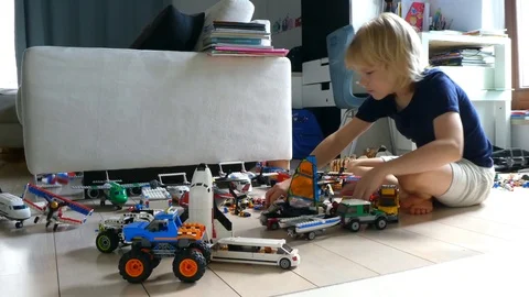 Cute Boy Playing With Lego Stock Footage 117003615