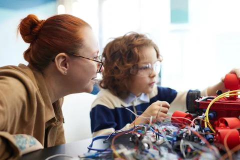 Cute Boy in Robotics Workshop Stock Photos