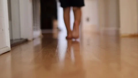 Cute boy running down hallway with teddy bear Video stock 96021668
