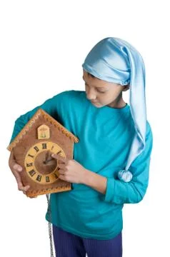 Cute boy in sleeping hat with clock isolated on white Stock Photos