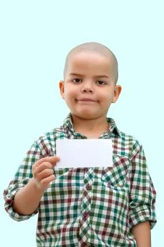 Cute boy standing with empty blank in hands, isolated on white Stock Photos