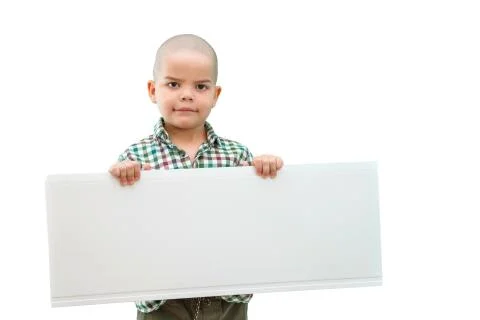 Cute boy standing with empty blank in hands, isolated on white Stock Photos