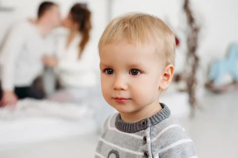 Cute boy standing in studio and looking away during christmas time Stockfoto's