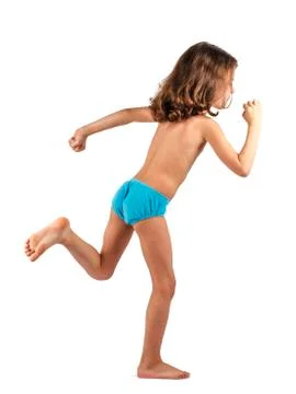 Cute boy in swimming trunks doing gymnastic exercises. White background. 스톡 사진