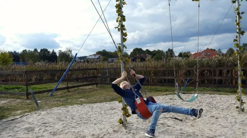 Cute boy on a swing. Stock Footage 118898688