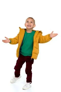 Cute boy in winter jacket having fun Stock Photos