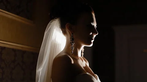 Cute brunette bride poses to the camera Stock Footage 45274967