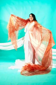 Cute brunette, white gitl weared white tulle and dancing Stock Photos