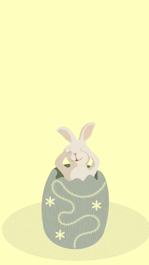 Cute Bunny Emerging from Egg with Paws Covering Eyes on Light Yellow Background Video stock 281784597