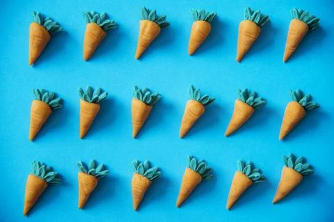 Cute carrots as a colorful pattern Stock Photos