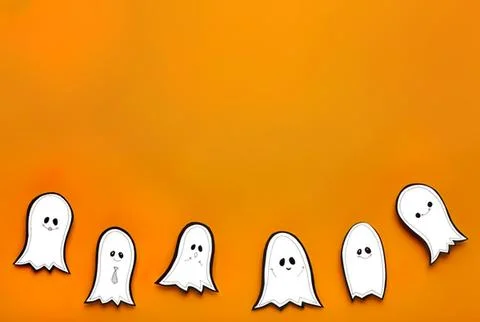 Cute cartoon ghosts with happy faces on orange background Stock Photos