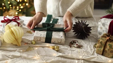 Cute cat walking on table and woman in cozy sweater Stock Footage 289475014