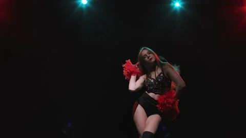 Cute cheerleader is dancing cheering dan... | Stock Video | Pond5