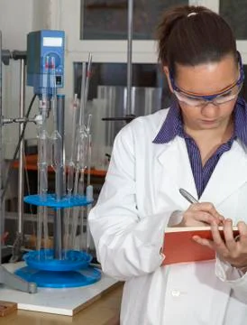 Cute chemist in laboratory Stock Photos