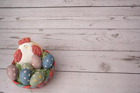 Cute chick, easter eggs and basket , Concept of happy easter day. Stock Photos