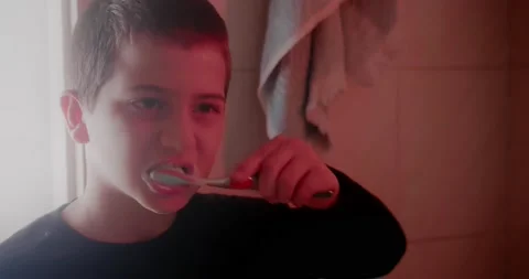 Cute Child Brushing His Teeth Before Sleeping ,Slow Motion Stock Footage 143975300