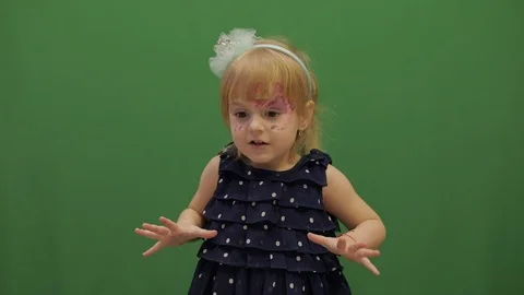 Cute child. Dancing and make faces. Parody of a well-known princess Elza Video stock 103440395