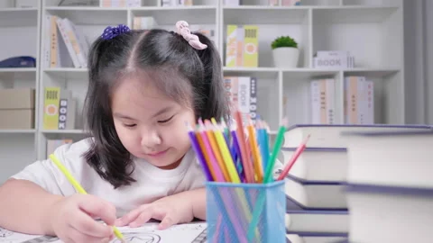 Cute child is drawing on white paper. Art school concept Stock Footage 163677573