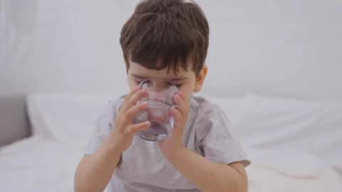 Cute Child Drinking Water Stock Footage 244541798
