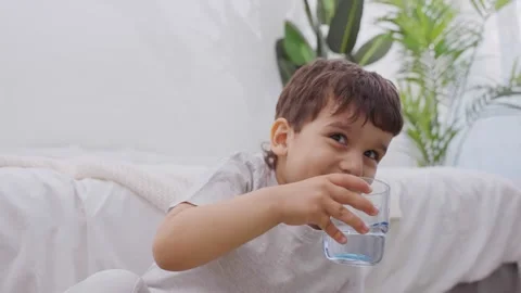 https://images.pond5.com/cute-child-drinking-water-footage-246133444_iconl.jpeg
