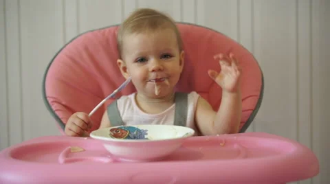 The cute child eats Stock Footage 62651861