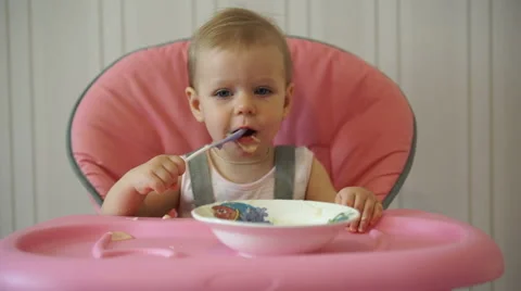 The cute child eats Stock Footage 62788400