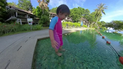 Cute child having fun in swimming pool Video stock 160187059