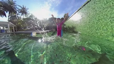 Cute child having fun in swimming pool Video stock 160187100