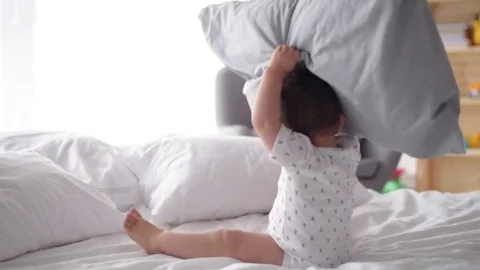 Cute child having laughs with mummy  Stock-Footage 75375694
