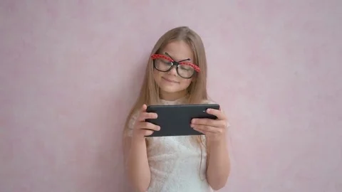 Cute child holding the tablet computer Stock Footage 69134538