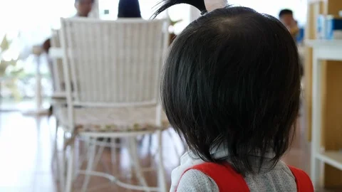 Cute child playing in cafe Stock Footage 89213929