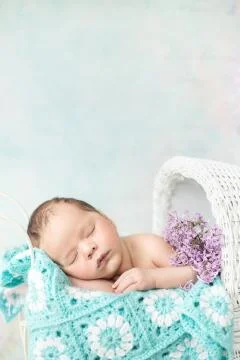 Cute child sleeping in the carriage Stock Photos