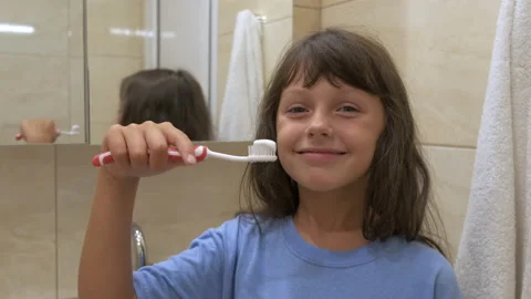 Cute child with a toothbrush. Stock Footage 227886604