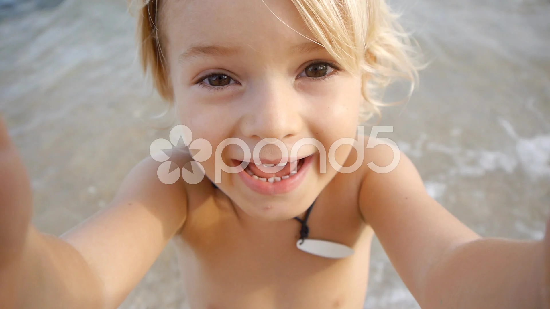 A cute child video chats on smartphone o...  Stock Video  Pond5