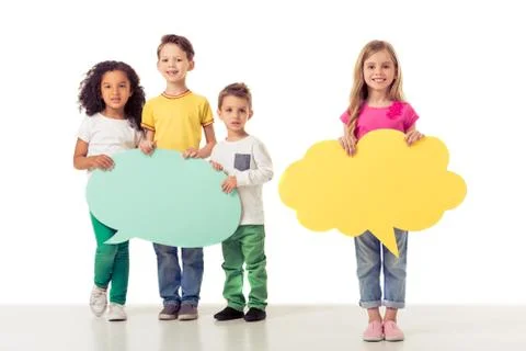 Cute children with speech bubble Stock Photos