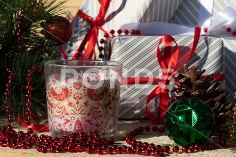 Cute christmas gifts with red ribbon near the christmas tree Stock Photos