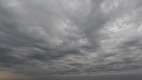 Cute cloudscape of sky with heavy rain or snow clouds bg - photo of nature Stock Photos
