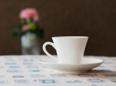 Cute coffee cup on table Stock Photos