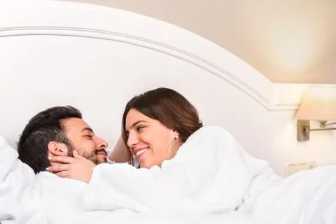 Cute Couple in bathrobe showing affection. Stock Photos