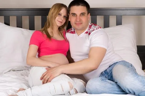 Cute couple in bed Stock Photos