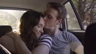 Cute Couple Cuddle And Kiss In Back Seat Of Moving Car (Slow Motion) Stock Footage